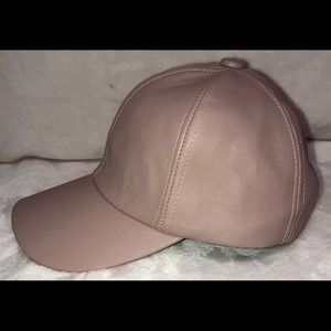A blush dusty rose pink leather hat